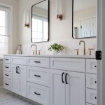 Remodeled white bathroom in Leesburg, VA featuring clean design and modern fixtures.