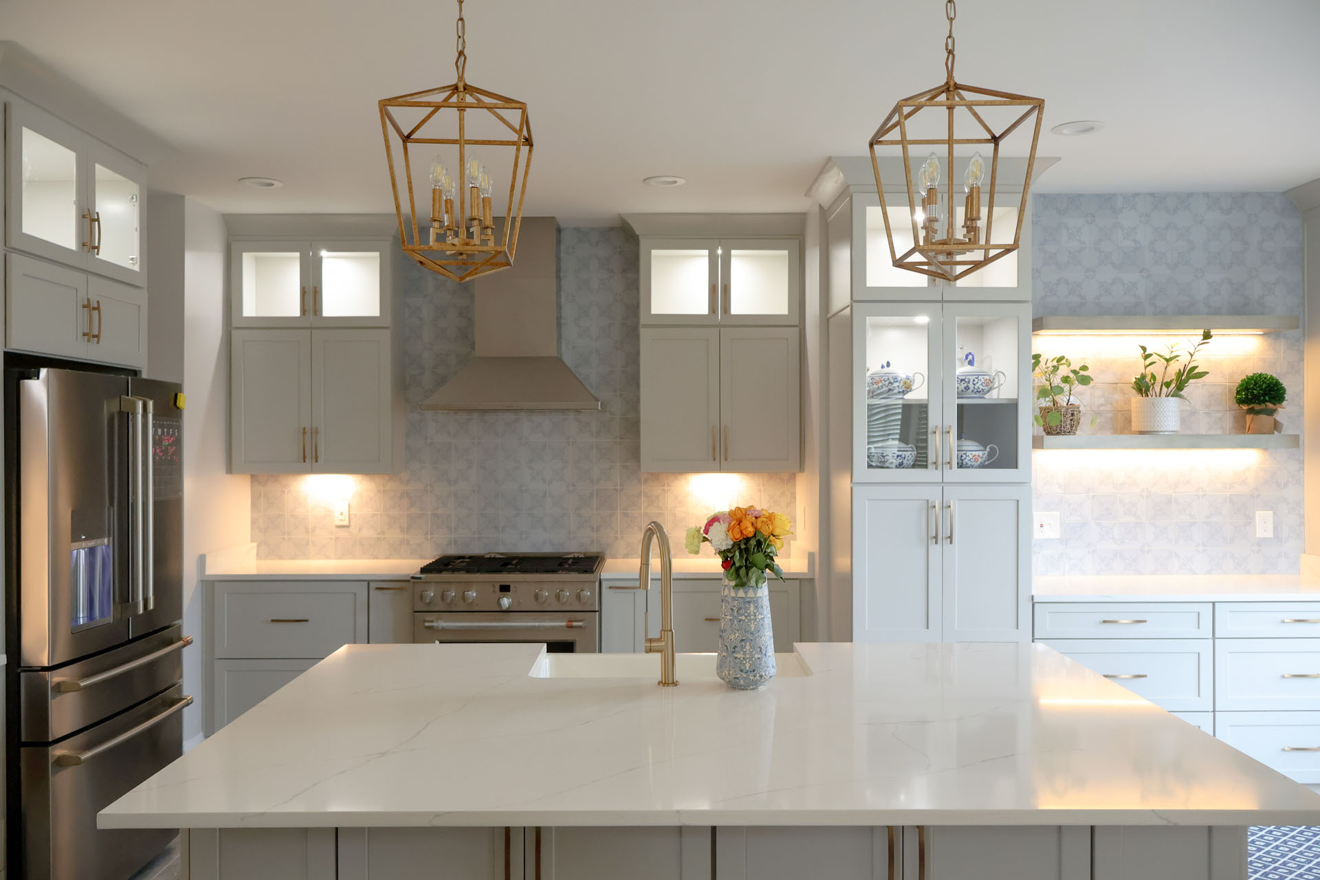 Alexandria VA kitchen remodel with custom cabinets gold pendant lighting quartz island and built in storage