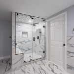 Walk-in glass shower with white marble tile, built-in bench, and matte black fixtures in an Arlington VA bathroom