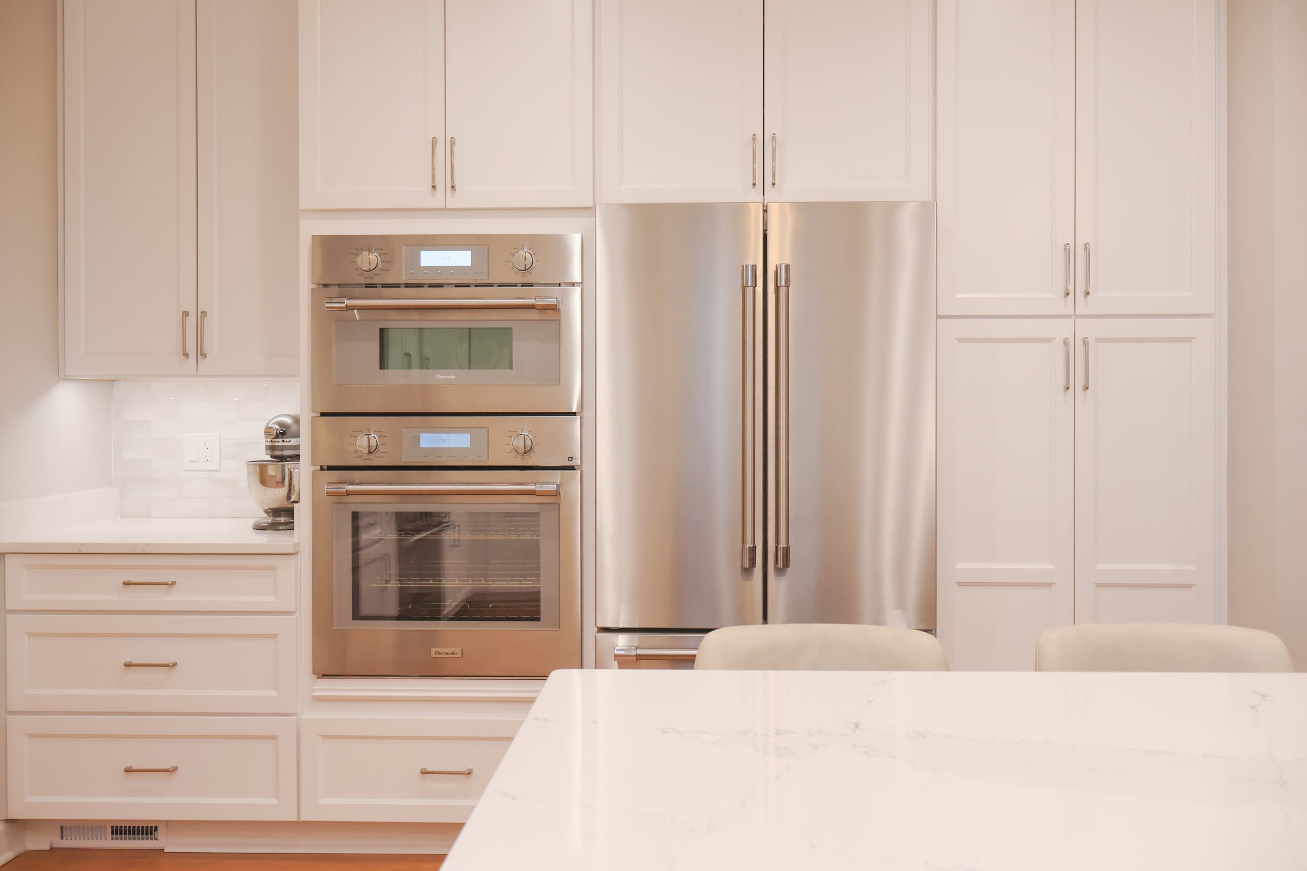 kitchen with stainless steel appliances and custom cabinetry